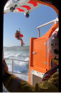 Swanage Lifeboat uses flare in helicopter rescue