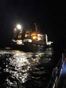 Capsized fishermen use liferaft flares to summon help