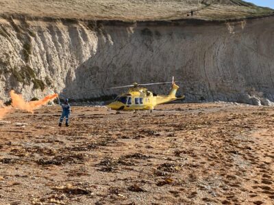 Flares guide air ambulance to injured base jumper